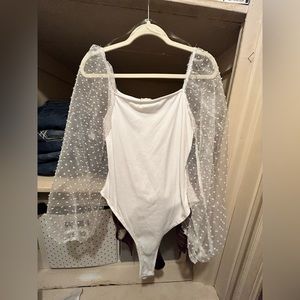 White mesh body suit. Worn once. Slightly see through.